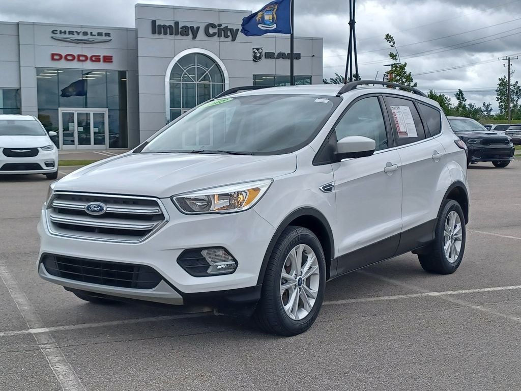 Used 2018 Ford Escape SE with VIN 1FMCU9GD1JUD42805 for sale in Imlay City, MI