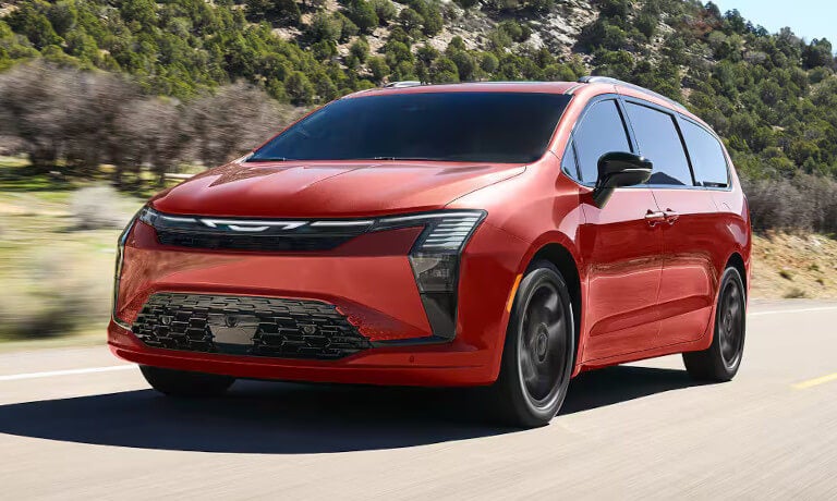 2027 Chrysler Pacifica driving fast on highway