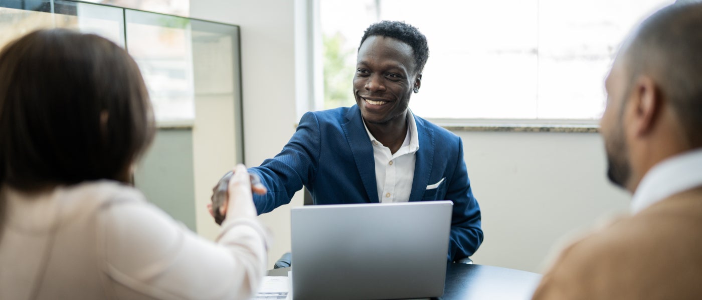 Business people shaking hands